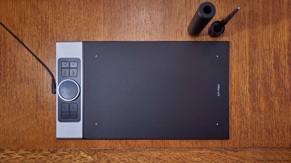 A bird's eye view shot of an XP-PEN Deco Pro Medium tablet on a table.