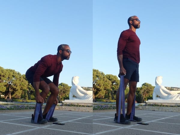 A man doing resistance band deadlift