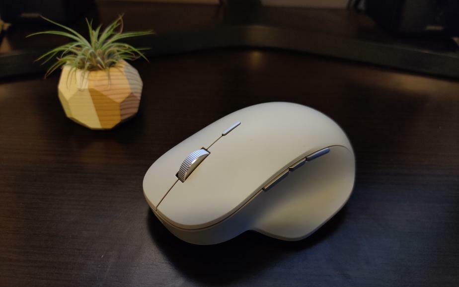 Microsoft mouse with plant