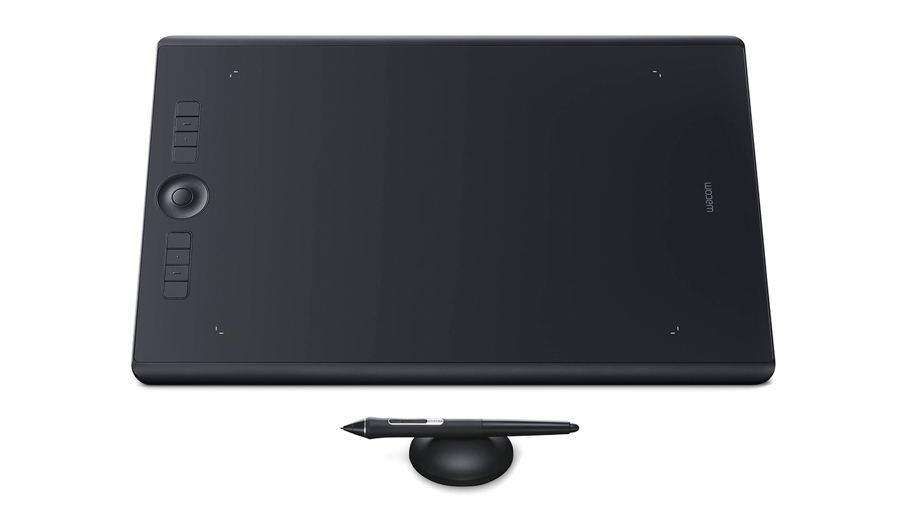 Product shot of Wacom Intuos Pro large drawing tablet with stylus on a white background.